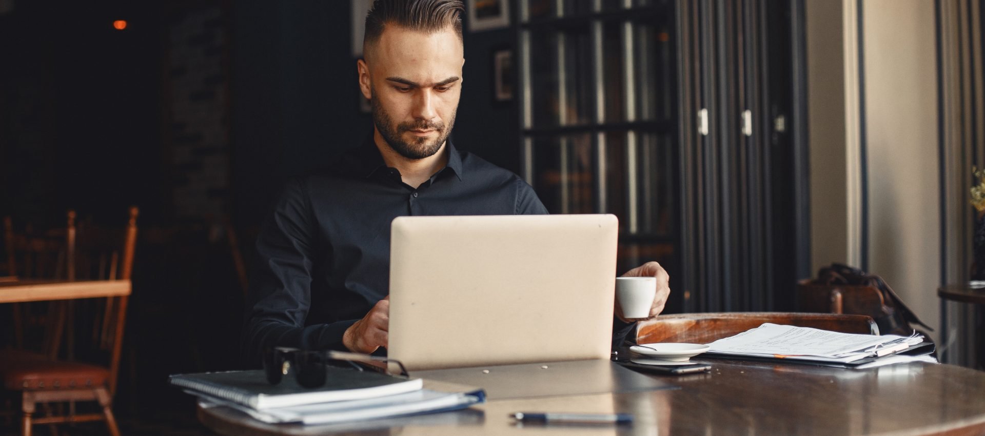 man drinks coffe businessman - Web Design Agency
